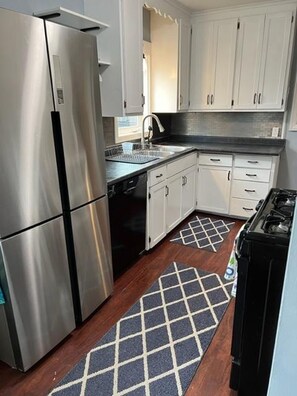 Fridge, microwave, oven, stovetop - Picturesque 3BR Home 5 miles from St Paul Airport! (Saint Paul)
