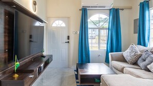 Bungalow, 2 Bedrooms, Patio, Ocean View | Living room - Escape to Paradise: Brand New Bungalow With Ocean View in Discovery Bay (Discovery Bay)