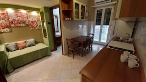Apartment, 1 Bedroom, Balcony | Dining room - Studio Near Alessandrino Metro C (Rome)