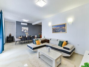 House (Four Bedroom Holiday Home with Swimmi) | Living room | TV