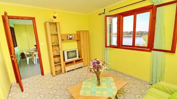Apartment (Three Bedroom Apartment with Terrace ) | Living room | TV