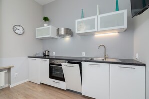Apartment, 1 Bedroom, Balcony | Private kitchen | Microwave, dishwasher, electric kettle, cookware/dishes/utensils