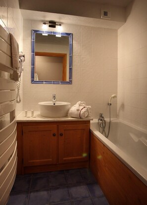 Hair dryer, towels, soap, shampoo