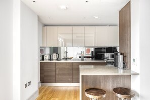 Fridge, microwave, oven, stovetop - Upscale St Johns Wood 2BR w/ Balcony, nr Regents Park, by Blueground (London)