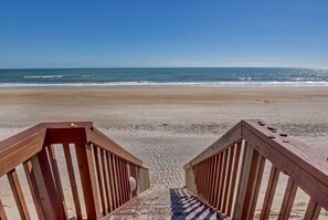 A wooden staircase leading to a beach with a clear view of the ocean. - Top Floor Oceanfront & Sound Views, Pool, (North Topsail Beach)