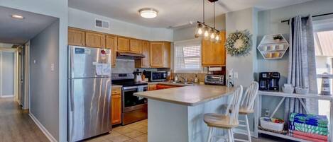 Coffee/tea maker, fridge, microwave, oven