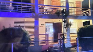 A two-story building with a balcony and a sign that reads "A SORA." - Best Location, Caribbean views, Off street parking, walk everywhere. (Vieques)