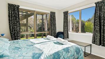 4 bedrooms, desk, iron/ironing board, travel cot