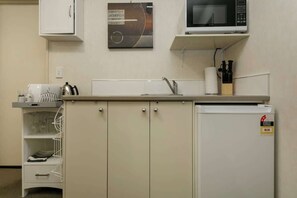 Fridge, microwave, coffee/tea maker, toaster
