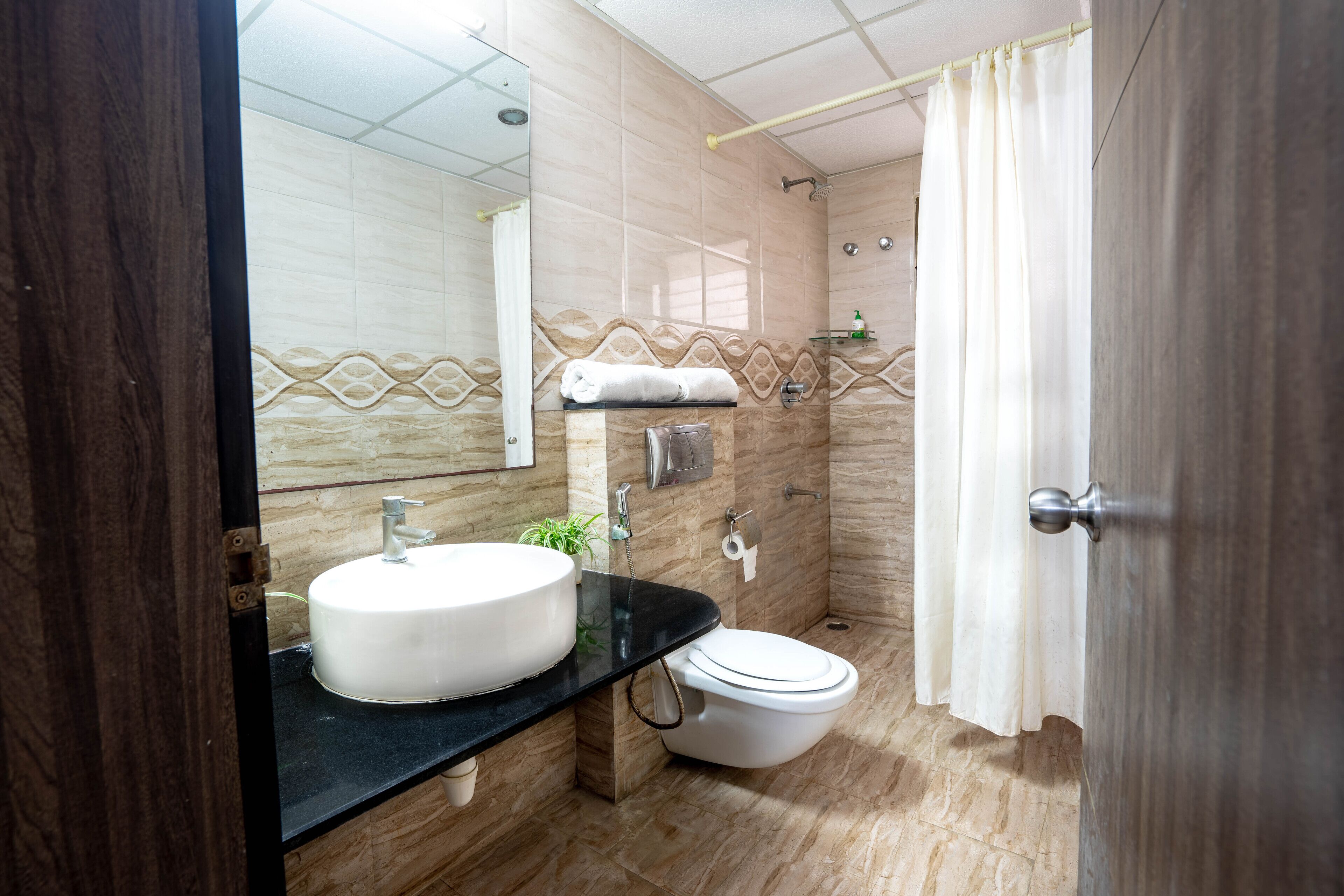 standard room | bathroom | shower, rainfall showerhead, free toiletries, towels