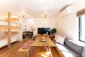 Design Apartment, Multiple Beds, Non Smoking, Kitchen | Living area | 55-inch LCD TV with cable channels, TV