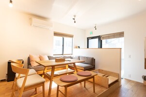 Design Apartment, Multiple Beds, Non Smoking, Kitchen | Living area | 55-inch LCD TV with cable channels, TV