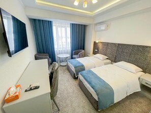 Deluxe-Doppel- oder -Zweibettzimmer | 1 Schlafzimmer, Zimmersafe, Schreibtisch, laptopgeeigneter Arbeitsplatz