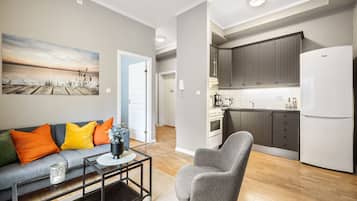 2 - Bedroom Apartment (2nd floor) | Living area | 50-inch Smart TV with cable channels, TV