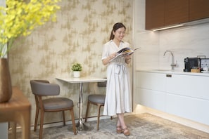 Suite, 1 chambre | Coin séjour
