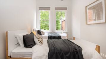 2 bedrooms, desk, iron/ironing board, travel cot