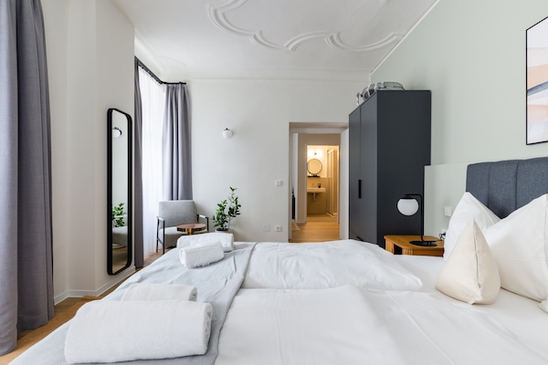 One-Bedroom Comfort Suite | Individually decorated, individually furnished, laptop workspace