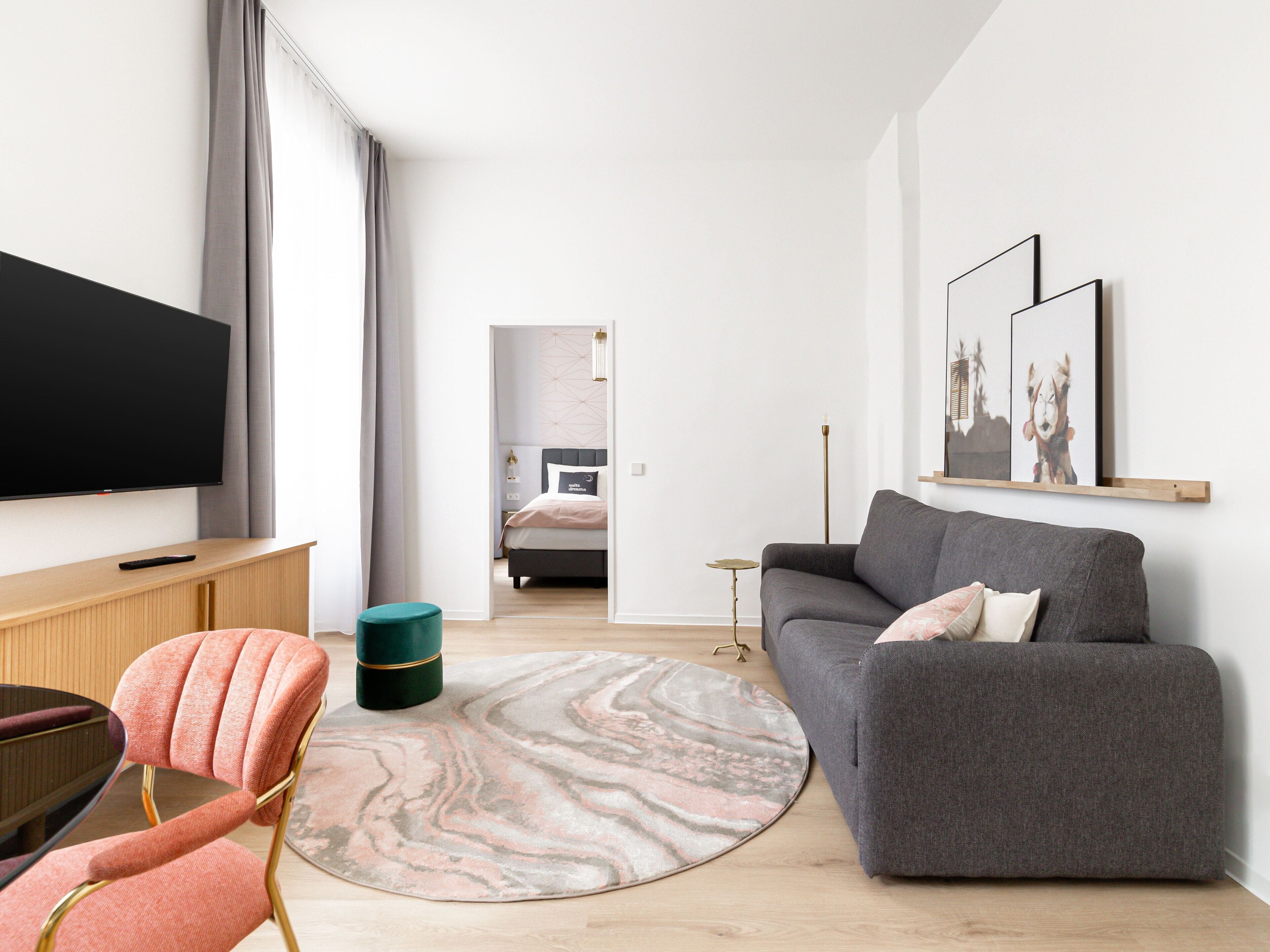 Autograph One-Bedroom Suite | Living area | 50-inch Smart TV with satellite channels, TV