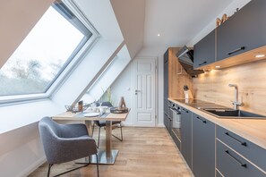 Réfrigérateur, four, plaque de cuisson, lave-vaisselle