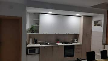 Apartment (One Bedroom Apartment with Sauna) | Private kitchen | Fridge