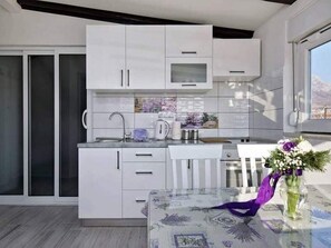 Studio (Studio Apartment with Sea View) | Private kitchen | Fridge, coffee/tea maker, dining tables - Lavanda Penthouse (Kastela)