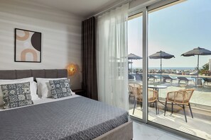 Standard Quadruple Suite Pool View | Udsigt fra værelset