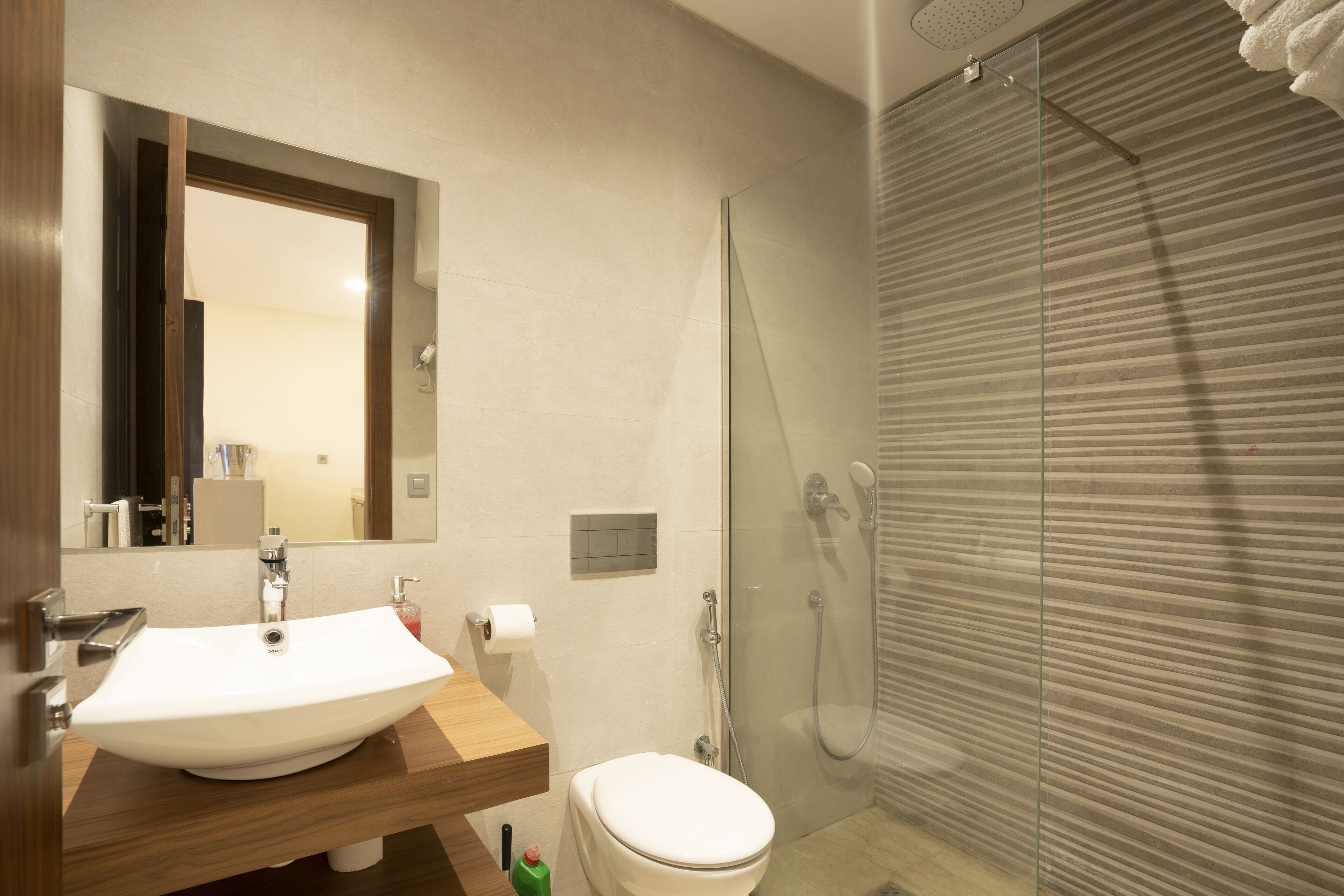 Shower, towels, soap, toilet paper