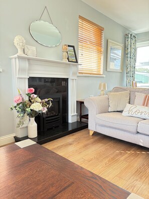 Smart TV, fireplace, DVD player, books