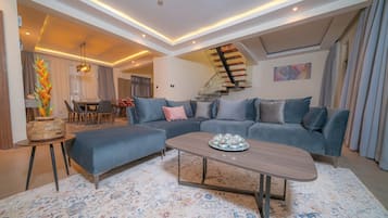 Duplex | Living area | 42-inch Smart TV with digital channels, TV