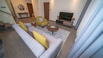 Duplex | Living area | 42-inch Smart TV with digital channels, TV