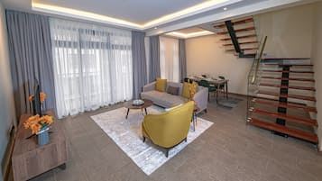 Duplex | Living area | 42-inch Smart TV with digital channels, TV