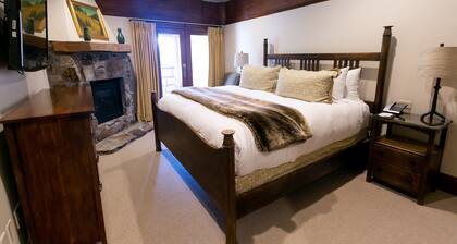 Deluxe King Room With Fireplace Hotel Room by RedAwning