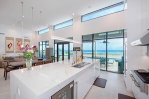 Fridge, microwave, oven, stovetop - Wind Upon the Waves: Newly Built Villa Near Health City w/ Private Pool, Home Gym & Luxe Interiors. (Cottage)