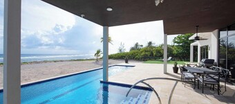 Wind Upon the Waves by Grand Cayman Villas