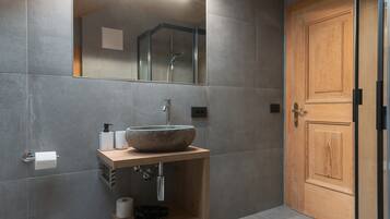 Bathtub, hair dryer, towels