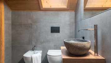 Bathtub, hair dryer, towels