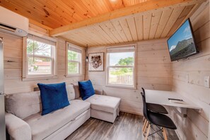 Habitació familiar | Sala d'estar | Televisor de pantalla plana de 32 polzades amb canals digitals 