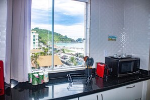 Apartamento | Cozinha privada | Geladeira, micro-ondas, liquidificador