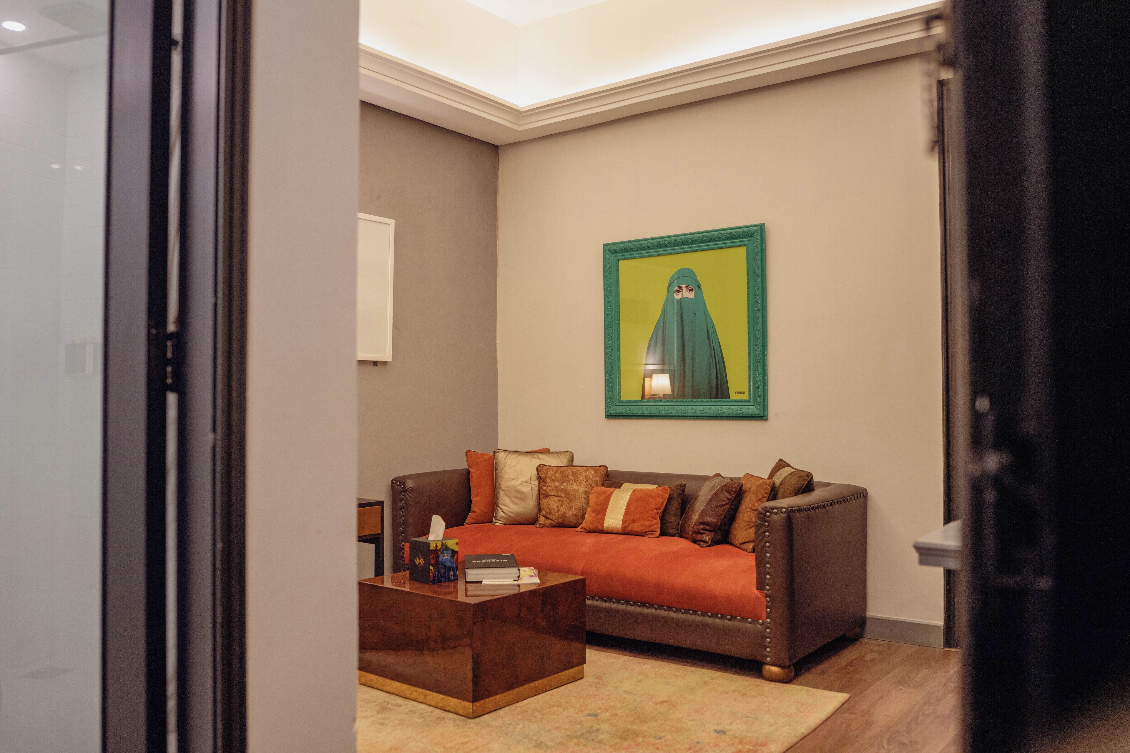 Ambiance One Bedroom Suite | Living area | 42-inch TV with cable channels, Netflix, streaming services
