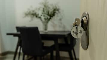 Economy Apartment | Living area | 28-inch flat-screen TV with cable channels, TV