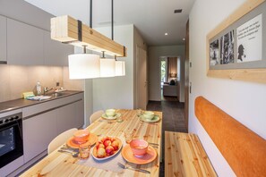 Standard Apartment, 2 Bedrooms | Private kitchen - SWISSPEAK Resorts Meiringen (Meiringen)