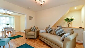 Cottage | Living area - Just Stay Wales - Castle Square Cottage (Swansea)
