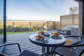 Deluxe huisje | Uitzicht vanaf balkon