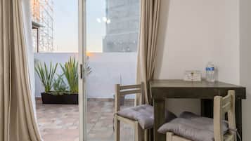 Panoramic Loft | In-room safe, desk, blackout drapes, iron/ironing board