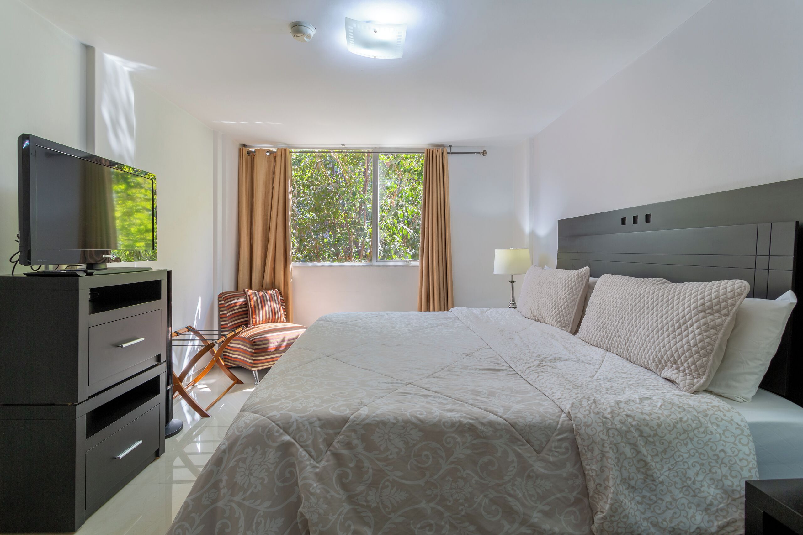 Comfort Suite, 1 Bedroom | In-room safe, desk, blackout drapes, iron/ironing board