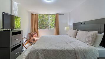 Comfort Suite, 1 Bedroom | In-room safe, desk, blackout drapes, iron/ironing board