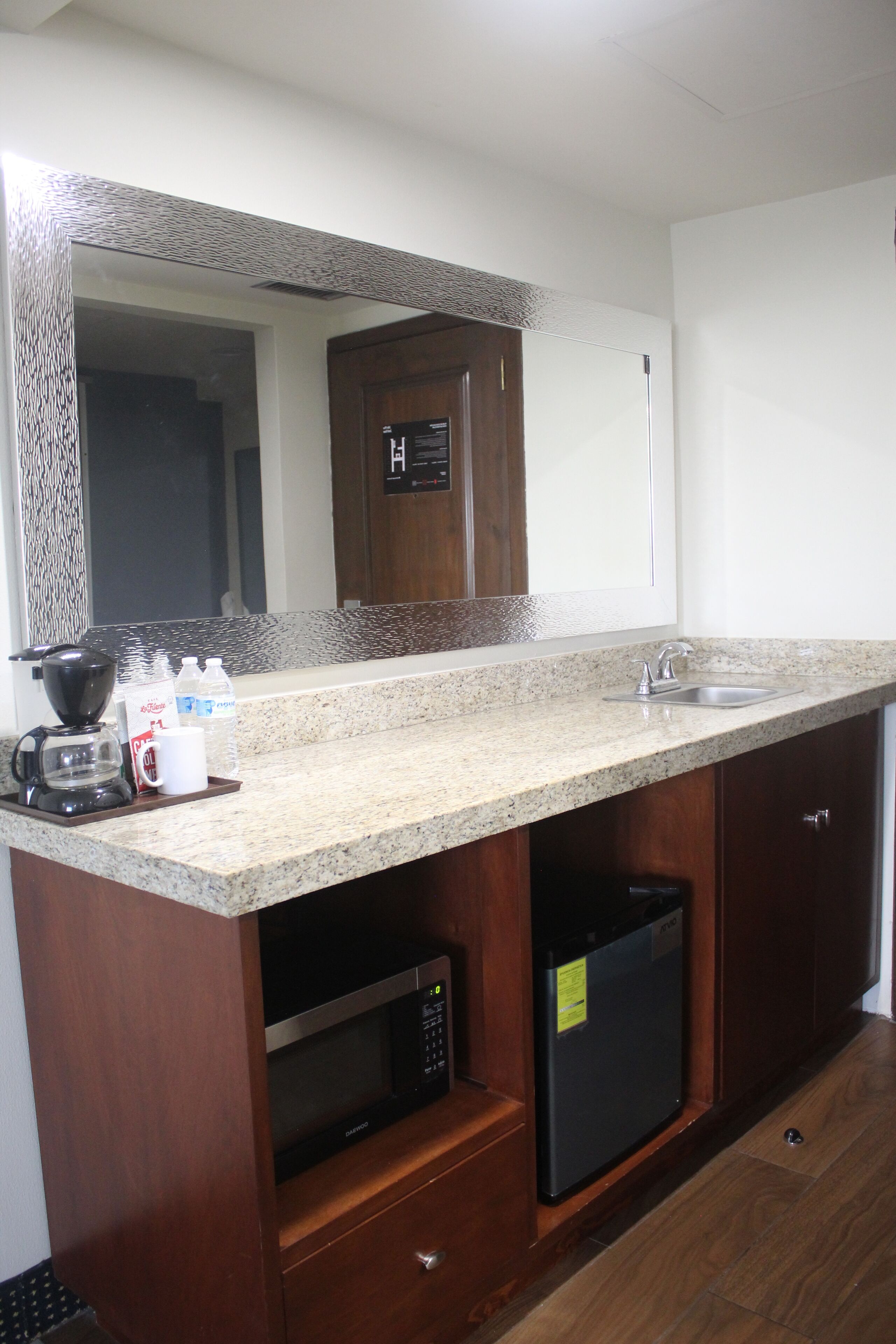 suite, 1 king bed, non smoking, kitchenette | private kitchen | coffee/tea maker