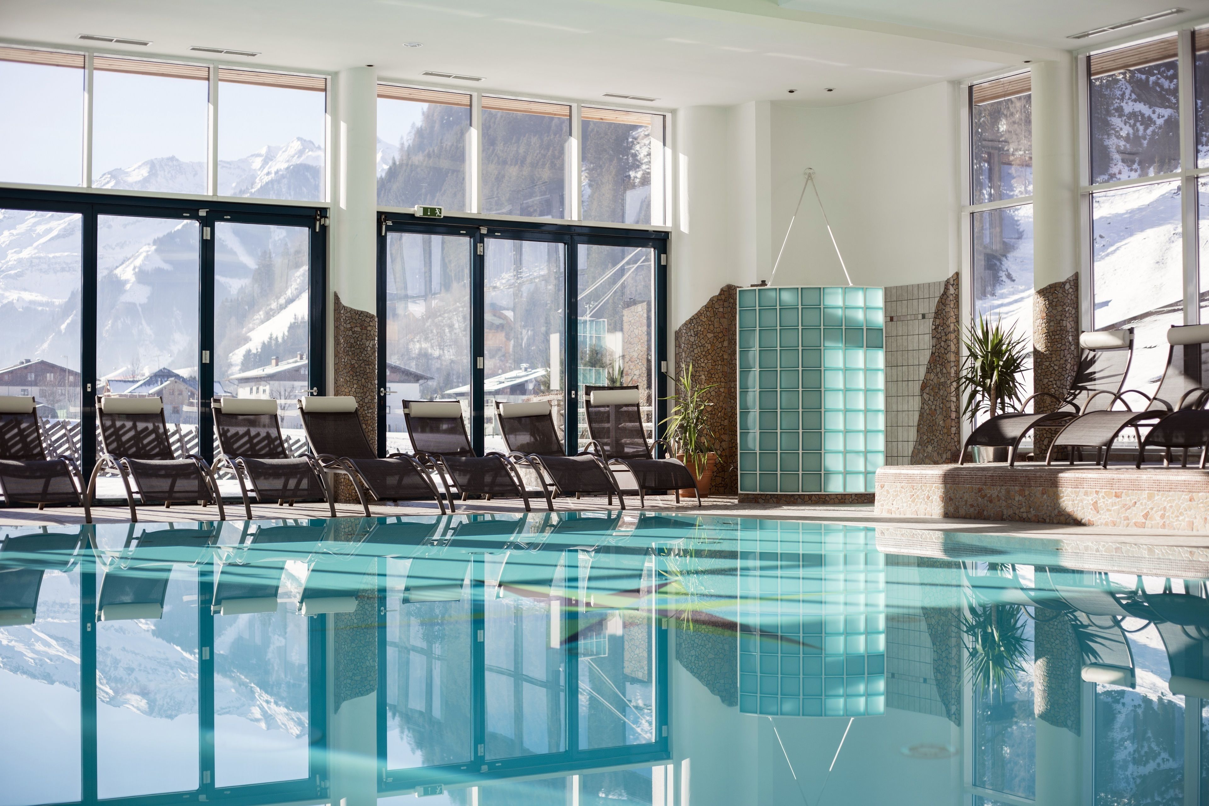 indoor pool, outdoor pool, pool umbrellas, pool loungers