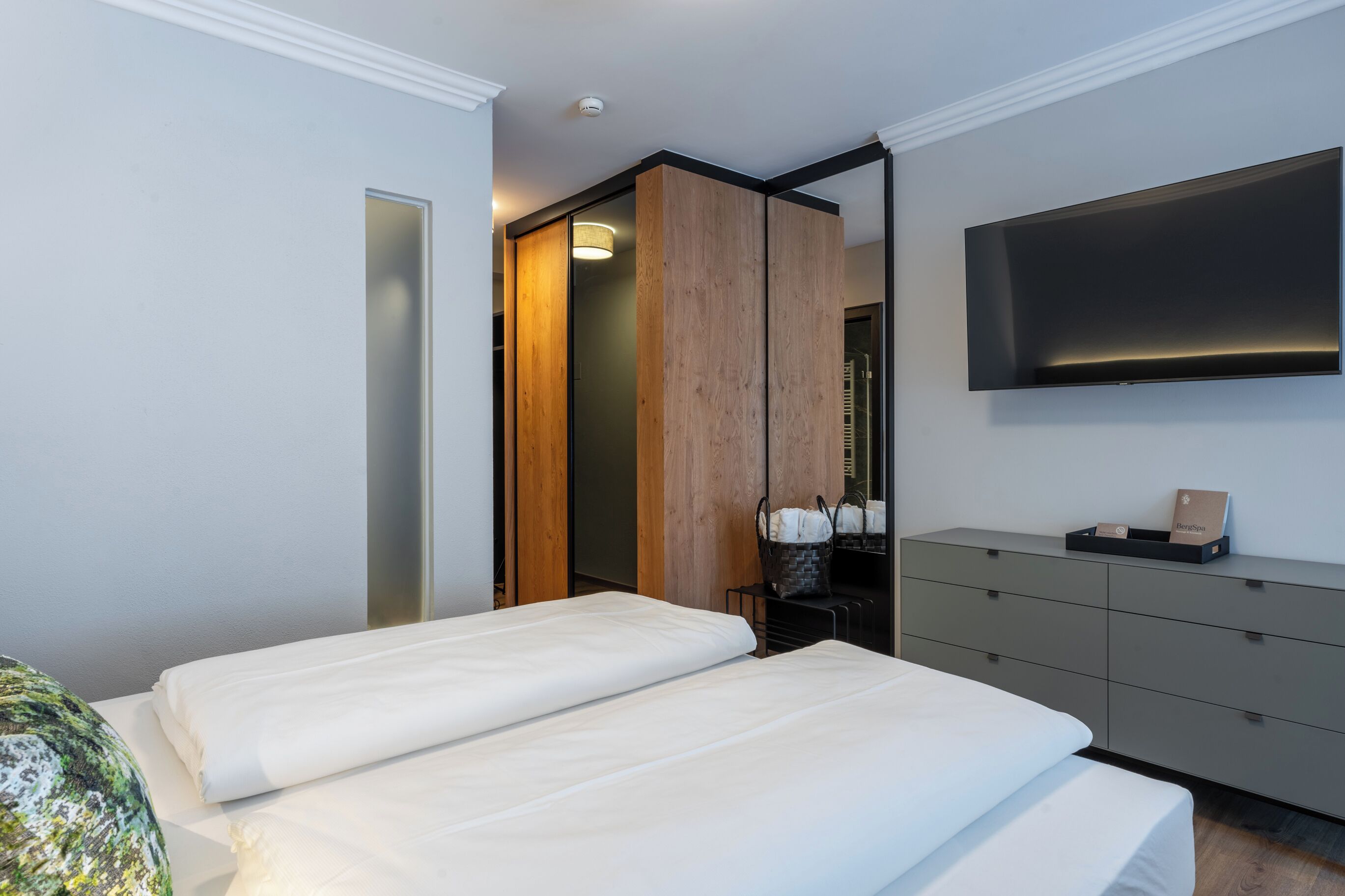 hypo-allergenic bedding, down duvets, in-room safe, desk