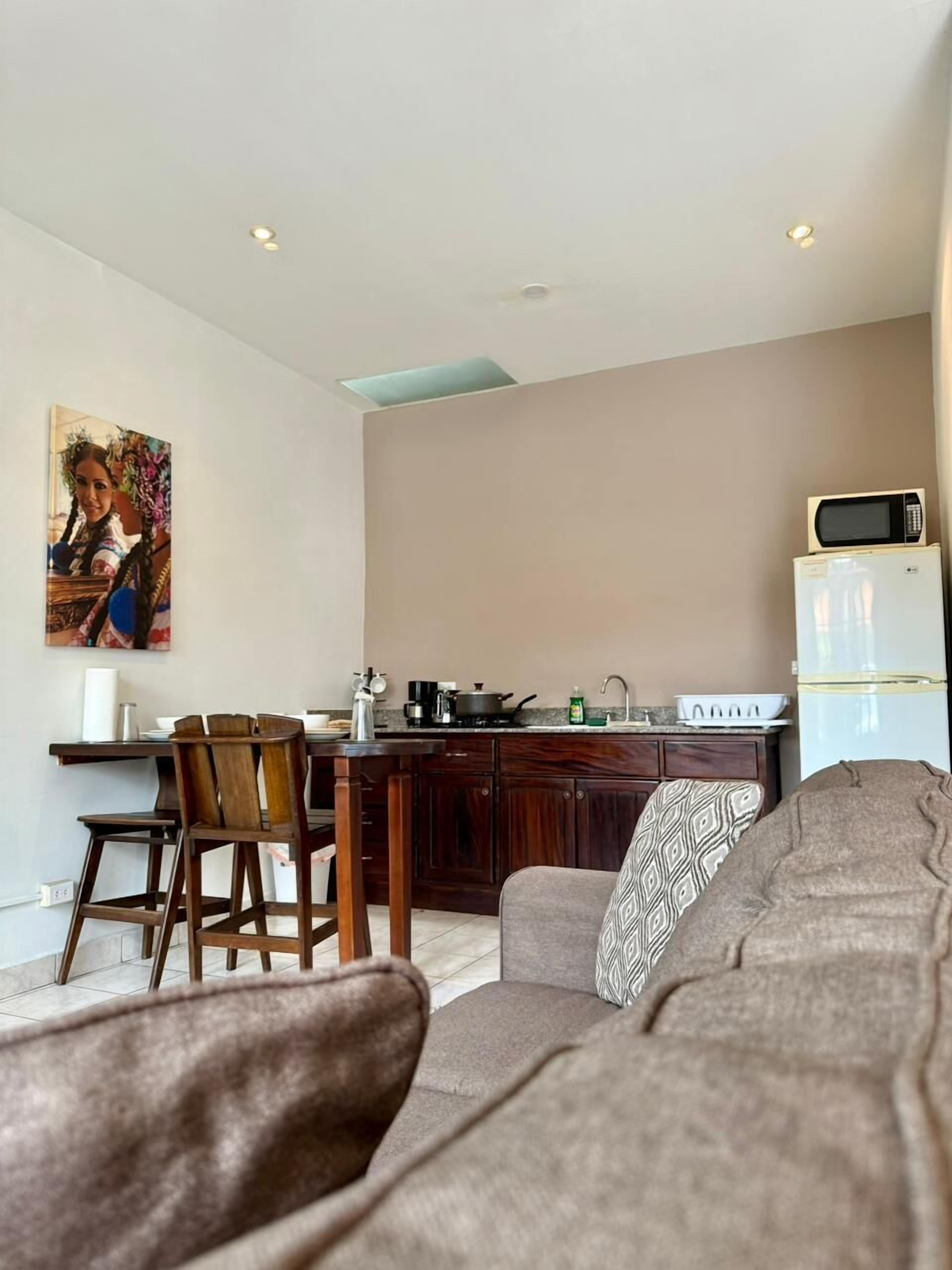 Room, Garden View | Private kitchen | Full-size fridge, microwave, stovetop, coffee/tea maker
